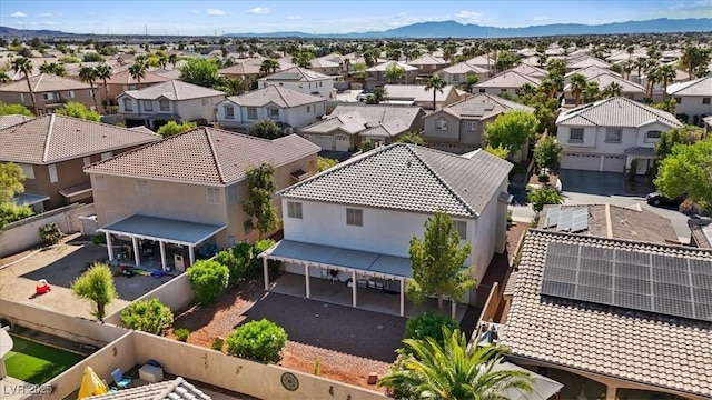 aerial view featuring a mountain view and a residential view