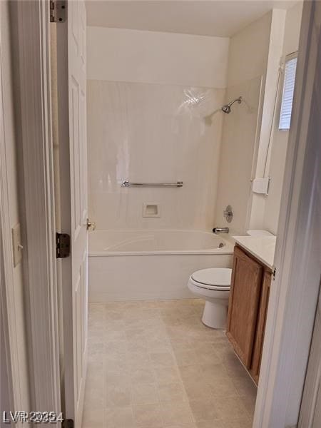 full bathroom featuring toilet, bathing tub / shower combination, and vanity