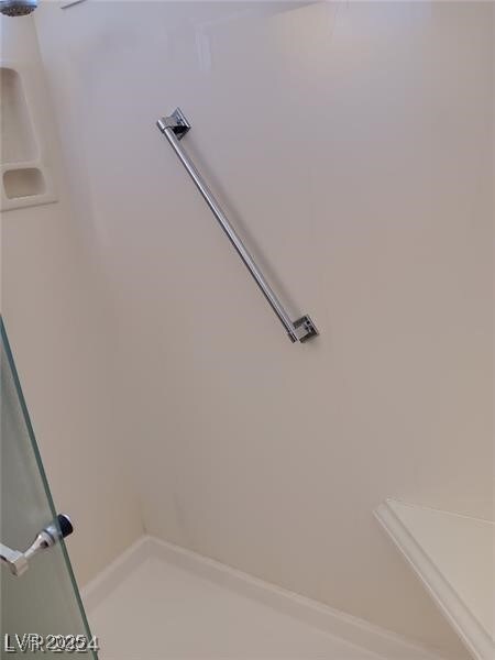 interior space featuring walk in shower