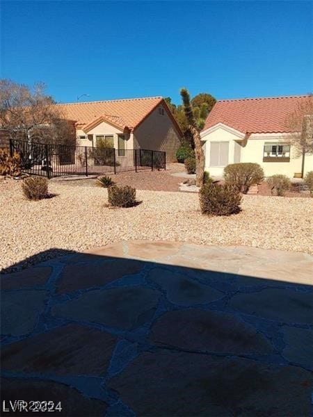 view of yard with fence and a fenced in pool