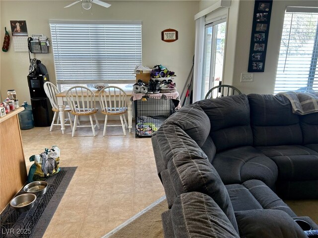 living room featuring ceiling fan