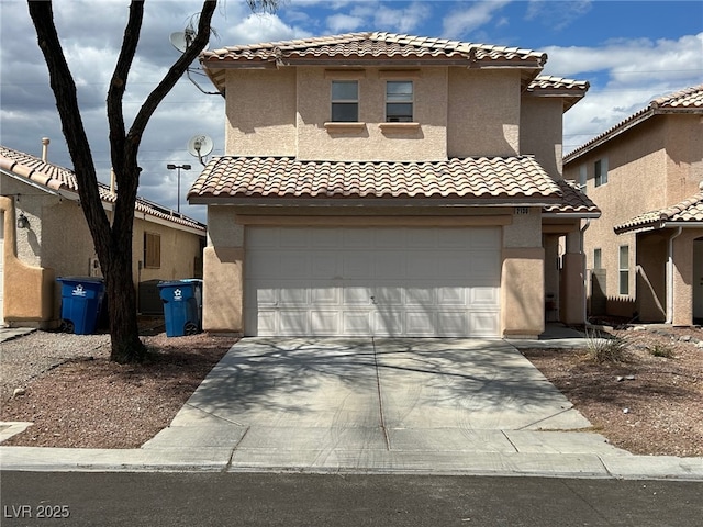mediterranean / spanish-style house featuring a garage, stucco siding, driveway, and a tile roof