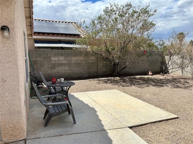 view of patio with a fenced backyard