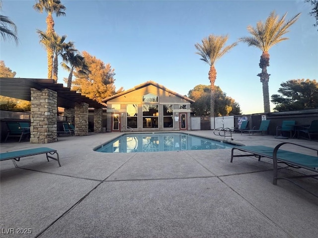 2750 S Durango Dr Unit 1038, Las Vegas, NV 89117 - pool at dusk with a fenced in pool and a patio area