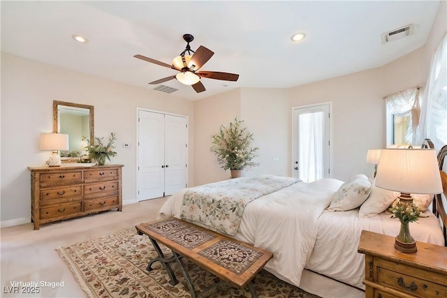 bedroom with recessed lighting, visible vents, and a closet