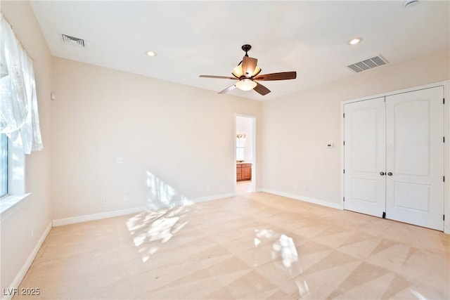 unfurnished bedroom featuring recessed lighting, baseboards, and visible vents