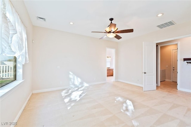 unfurnished bedroom with recessed lighting, baseboards, and visible vents