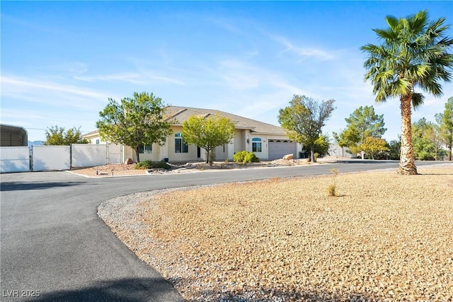 single story home with fence and stucco siding