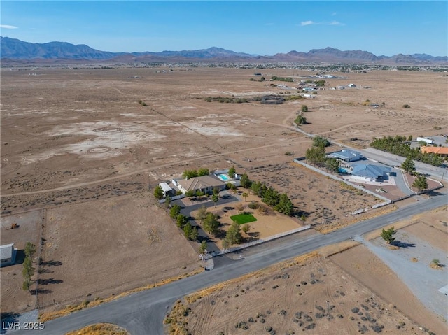 bird's eye view with a rural view, a mountain view, and a desert view