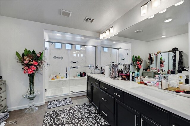 9045 Knots Estate St, Las Vegas, NV 89139 - full bath featuring double vanity, a sink, visible vents, and a shower stall