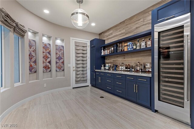 1911 Alcova Ridge Dr, Las Vegas, NV 89135 - bar featuring wine cooler, hanging light fixtures, recessed lighting, and wet bar