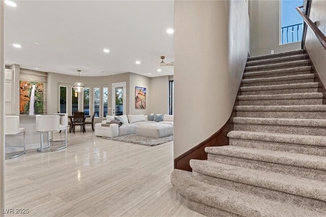 1911 Alcova Ridge Dr, Las Vegas, NV 89135 - stairway with recessed lighting and a ceiling fan