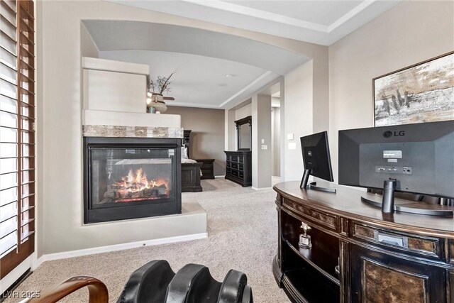 1911 Alcova Ridge Dr, Las Vegas, NV 89135 - living room featuring carpet flooring, arched walkways, baseboards, and a multi sided fireplace