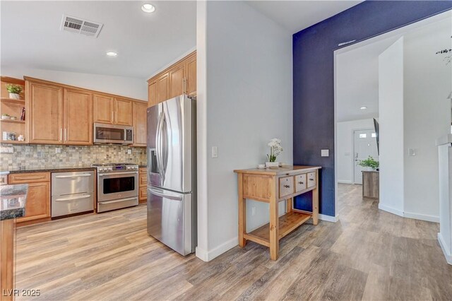 kitchen with open shelves, appliances with stainless steel finishes, decorative backsplash, light wood-type flooring, and visible vents