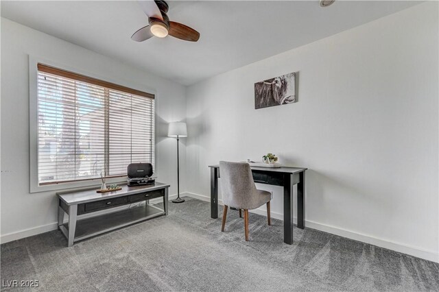 office with carpet floors, ceiling fan, and baseboards