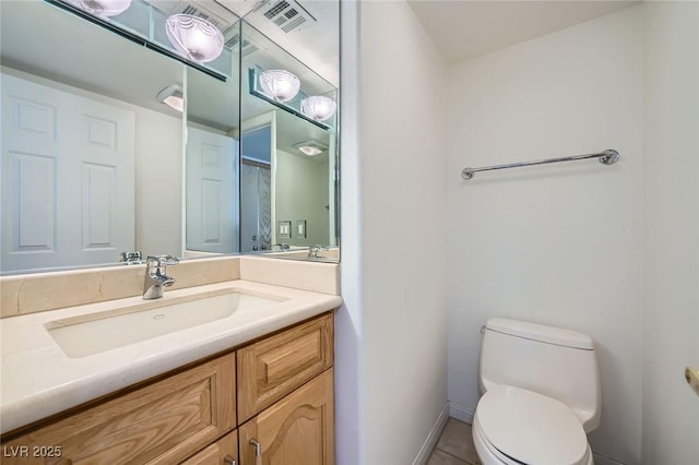 3111 Bel Air Dr Unit 18B, Las Vegas, NV 89109 - bathroom with tile patterned flooring, vanity, toilet, baseboards, and visible vents
