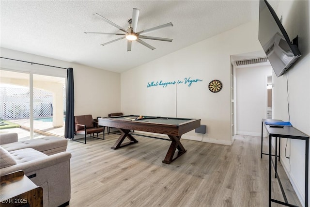 4471 Wisconsin Ave, Las Vegas, NV 89104 - rec room featuring a ceiling fan, light wood-type flooring, a textured ceiling, and visible vents