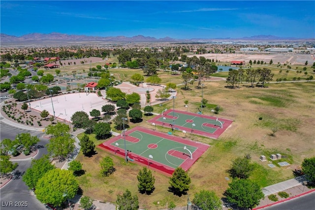 birds eye view of property with a mountain view
