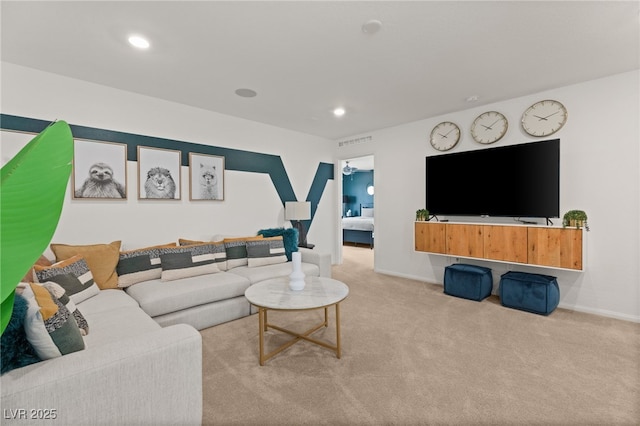 carpeted living room with baseboards, recessed lighting, and visible vents