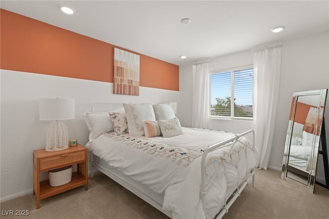 bedroom with baseboards, light carpet, and recessed lighting