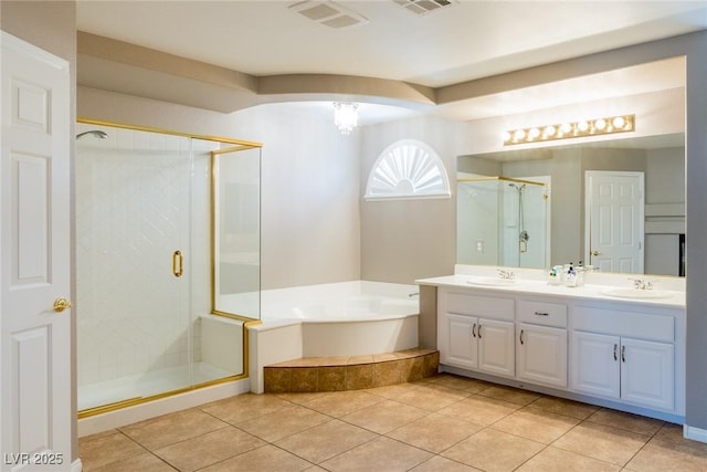 full bath with visible vents, a sink, a bath, and a stall shower