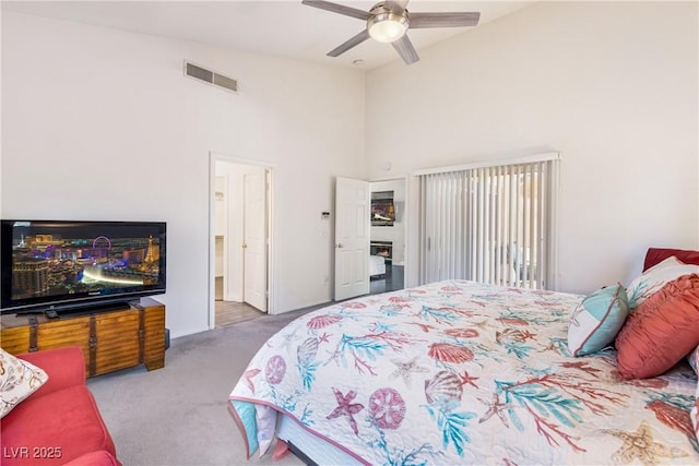 1084 Little House Ct, Henderson, NV 89011 - bedroom with carpet flooring, ceiling fan, high vaulted ceiling, access to exterior, and visible vents