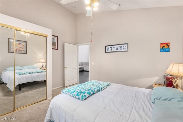 1084 Little House Ct, Henderson, NV 89011 - bedroom featuring carpet floors, a closet, a towering ceiling, baseboards, and a ceiling fan