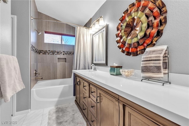 full bath with vanity, shower / tub combo with curtain, and lofted ceiling