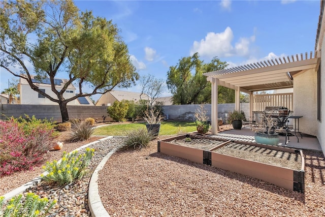 view of yard with a fenced backyard, a patio, a pergola, and a vegetable garden