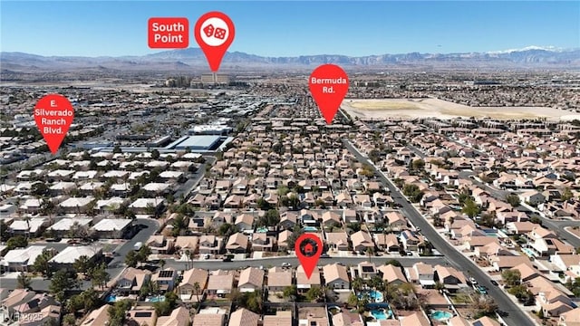 aerial view featuring a mountain view and a residential view
