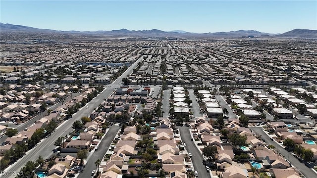 bird's eye view featuring a residential view and a mountain view