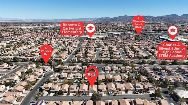 birds eye view of property featuring a residential view and a mountain view