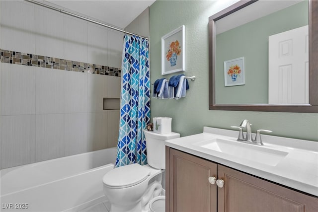 full bath featuring vanity, shower / bath combo with shower curtain, and toilet