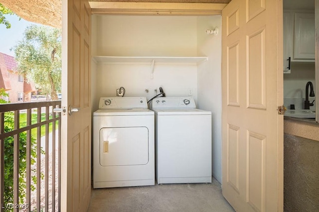 4980 Indian River Dr Unit 447, Las Vegas, NV 89103 - washroom featuring laundry area, plenty of natural light, and washing machine and clothes dryer