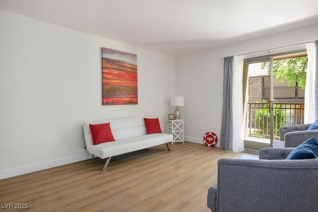 4980 Indian River Dr Unit 447, Las Vegas, NV 89103 - living area featuring baseboards and wood finished floors