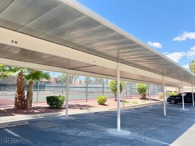 4980 Indian River Dr Unit 447, Las Vegas, NV 89103 - covered parking lot featuring fence