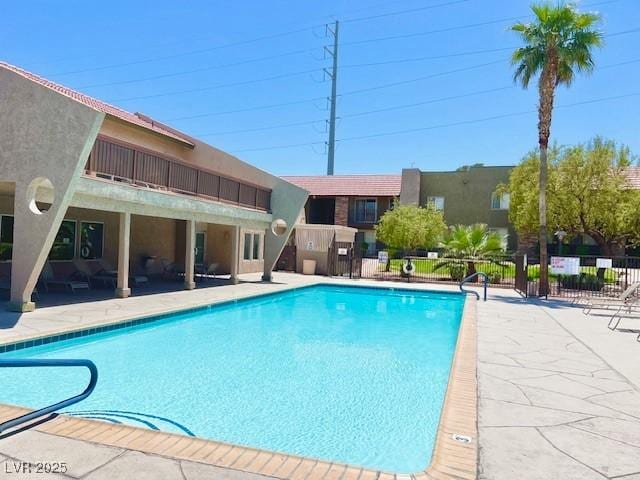 4980 Indian River Dr Unit 447, Las Vegas, NV 89103 - pool with fence and a patio area