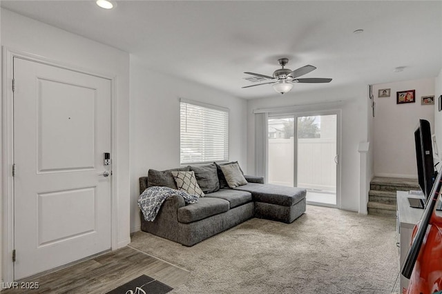 living room featuring baseboards, recessed lighting, ceiling fan, and wood finished floors