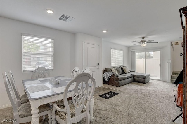 dining space with visible vents, recessed lighting, carpet, and ceiling fan