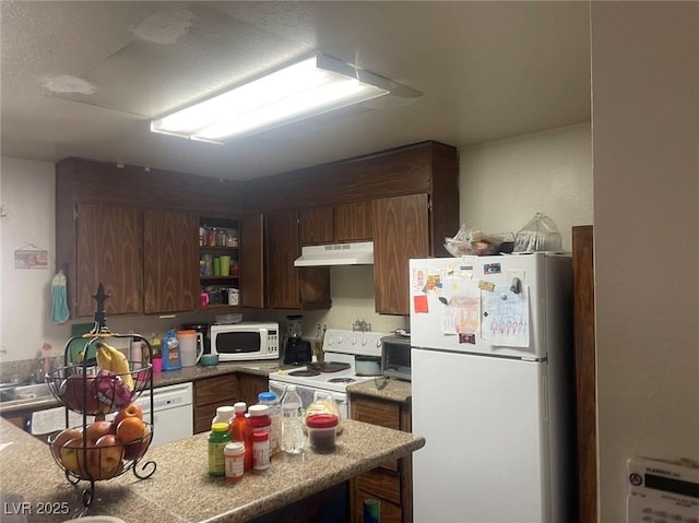 2574 Paradise Village Way, Las Vegas, NV 89120 - kitchen featuring white appliances, under cabinet range hood, open shelves, light countertops, and a peninsula
