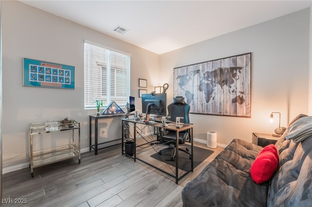356 Silva Pl, Henderson, NV 89011 - office space with baseboards, wood finished floors, and visible vents