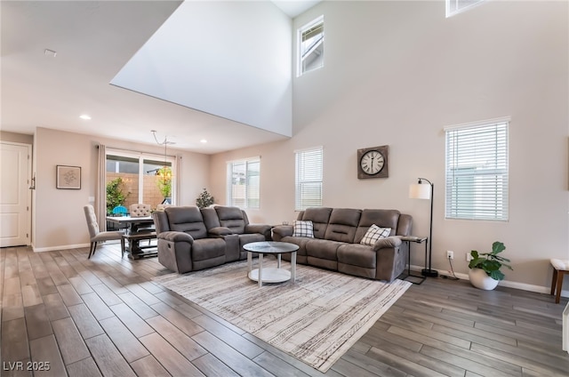 356 Silva Pl, Henderson, NV 89011 - living room with baseboards, recessed lighting, a towering ceiling, and wood finished floors
