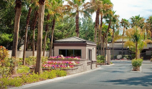 exterior space with a gate