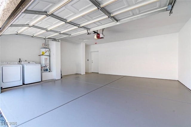 garage with secured water heater, separate washer and dryer, and a garage door opener