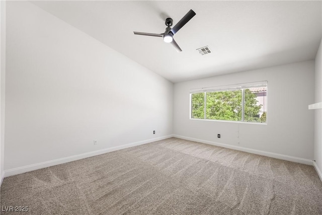 10244 Amber Hue Ln, Las Vegas, NV 89144 - spare room featuring ceiling fan, vaulted ceiling, baseboards, and carpet