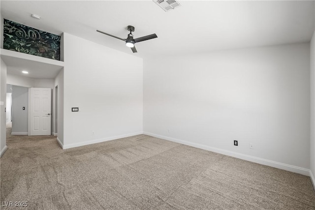 unfurnished room featuring baseboards, ceiling fan, carpet flooring, and visible vents