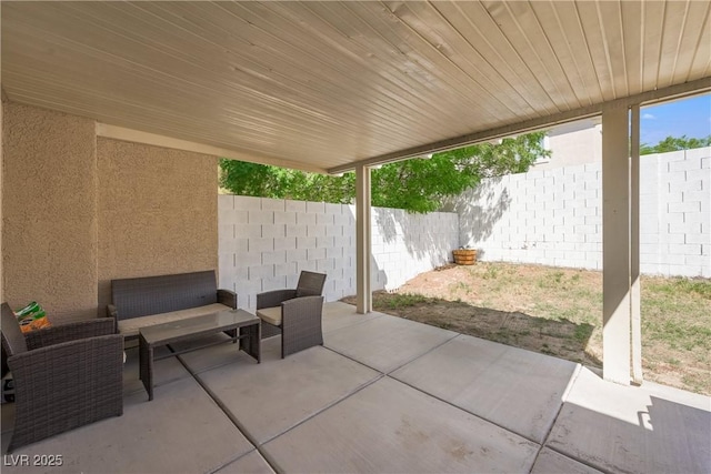 view of patio featuring a fenced backyard