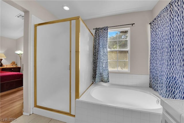 ensuite bathroom with a bath, visible vents, a stall shower, ensuite bathroom, and recessed lighting