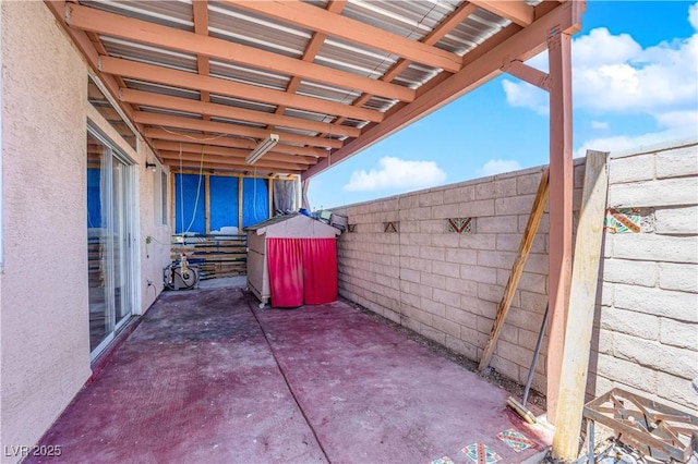 view of patio with fence