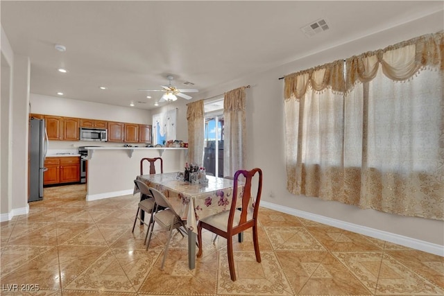 dining area with recessed lighting, baseboards, light tile patterned floors, and visible vents